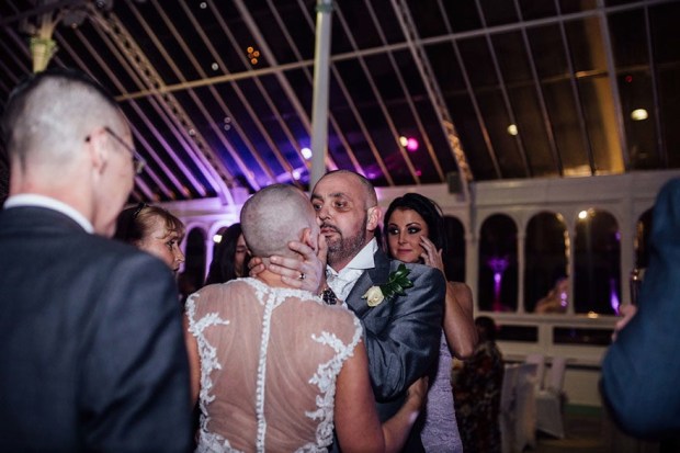 bride shaves her head at wedding 