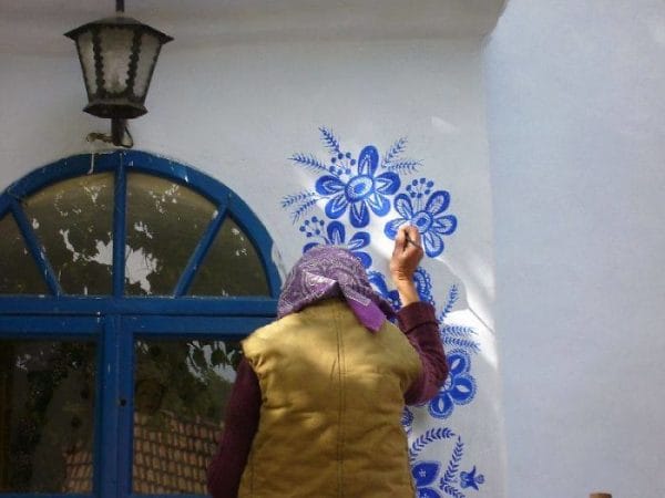 grandma paints neighborhood houses