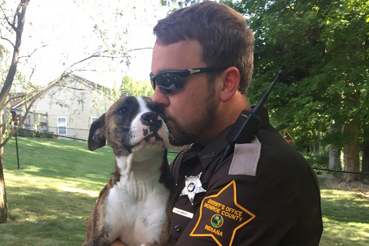 police officer adopts abandoned dog