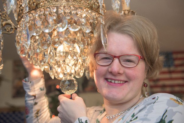 woman engaged to chandelier