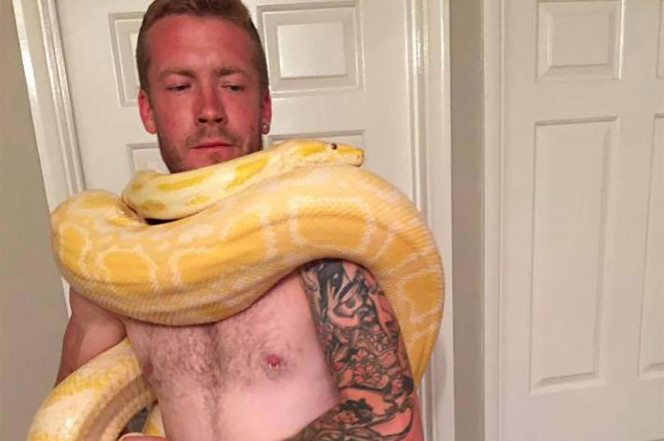 man dies after python suffocates him