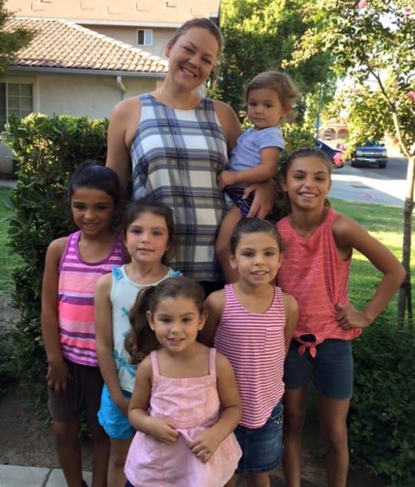 single mom adopts 6 sisters