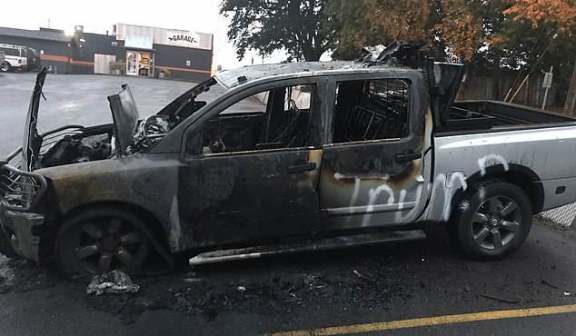 truck with pro-trump stickers on fire